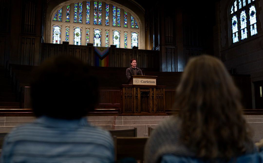 Convocation speaker Bob Daily '82 at center stage of Chapel