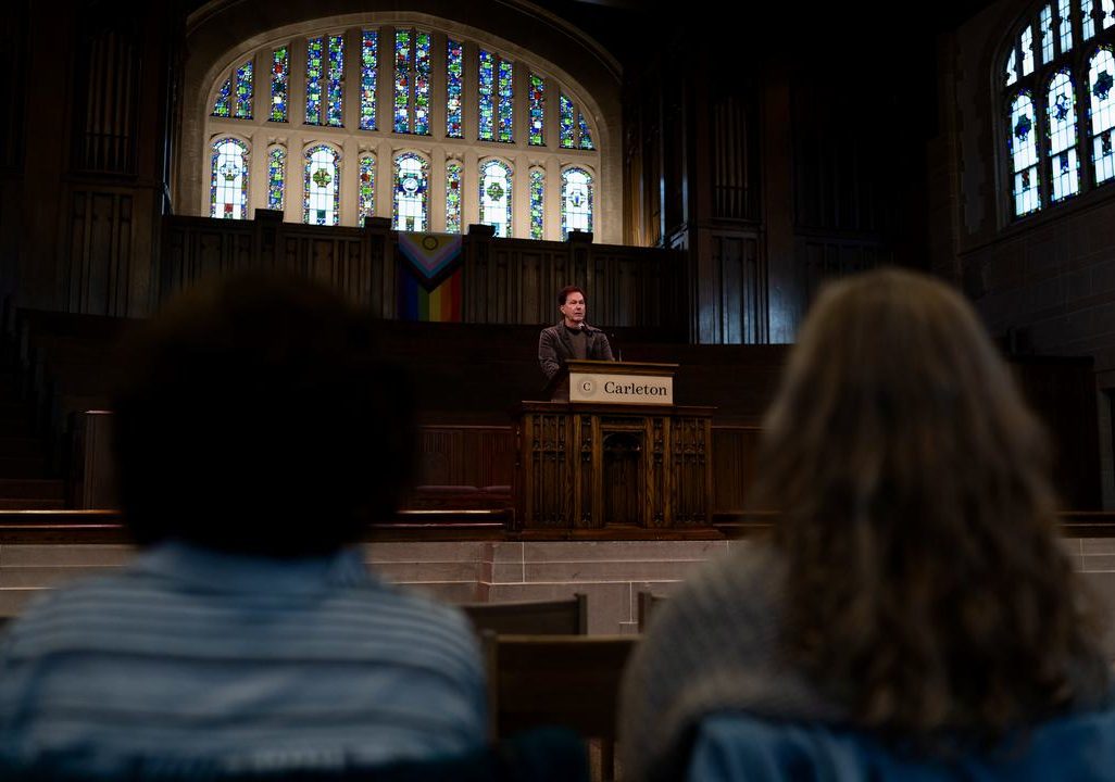 Convocation speaker Bob Daily '82 at center stage of Chapel