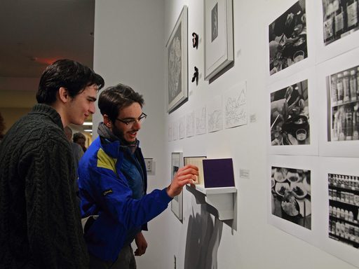 Students at an art exhibition