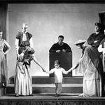 Historic photograph of a play at Carleton.