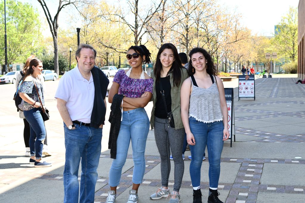 President Poskanzer with three students