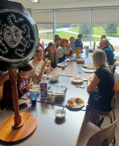 students and faculty eating lunch together