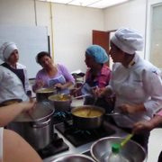 Students teach others how to make a traditional Ecuadorian soup with green bananas or platanos.