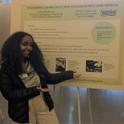 Maya Kassahun presents her poster on her summer fellowship with the City of Northfield.