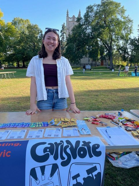 Carleton student tabling for CarlsVote.