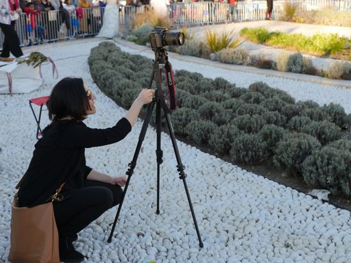 Palmar Álvarez-Blanco sets up a camera on a tripod