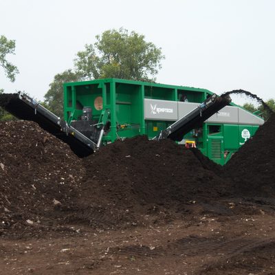 After curing for several months, contaminants are screened out of the compost.