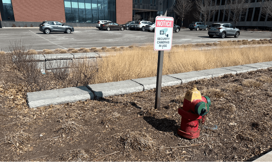 sign next to fire hydrant