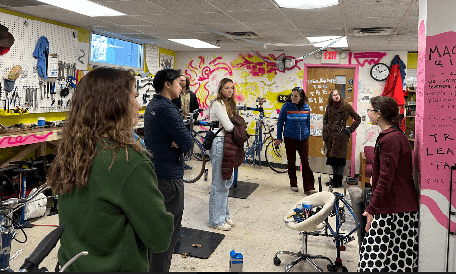 group gathers in a classroom