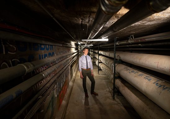 Rob Hanson, energy manager at Carleton College, looking the geothermal pipes below campus.