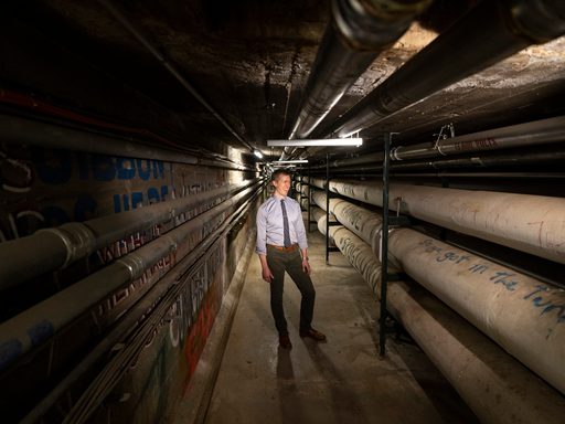 Rob Hanson, energy manager at Carleton College, looking the geothermal pipes below campus.