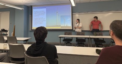 students presenting in a classroom