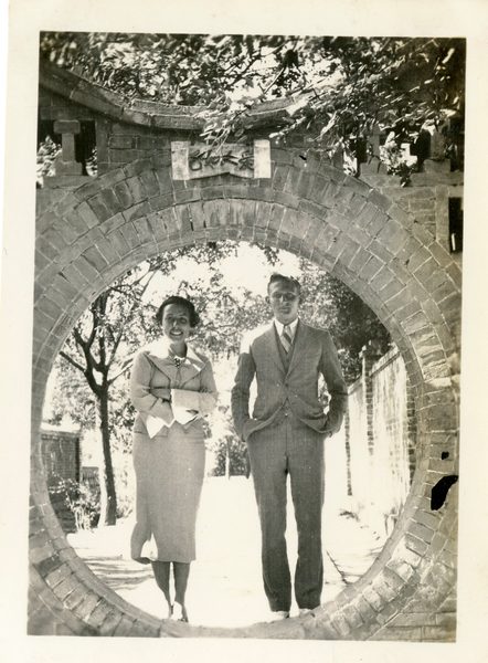 Bernice Brown '37 and Carl Huber '38 at the Moon Gate
