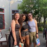 Three GWSS seniors posing for a photo on the AGH patio at the spring '23 Strawberries & Chocolate Celebration.