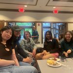 GWSS students and faculty posing for a photo at the spring '25 Strawberries & Chocolate Celebration.