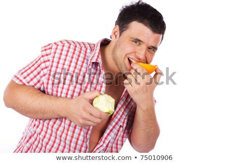 stock photo of a man eating fruit