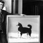Gould with a portrait of "Al Smith," his favorite sled dog from 1928-30.