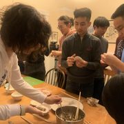 Dumpling making event hosted by OIIL at Dacie Moses House