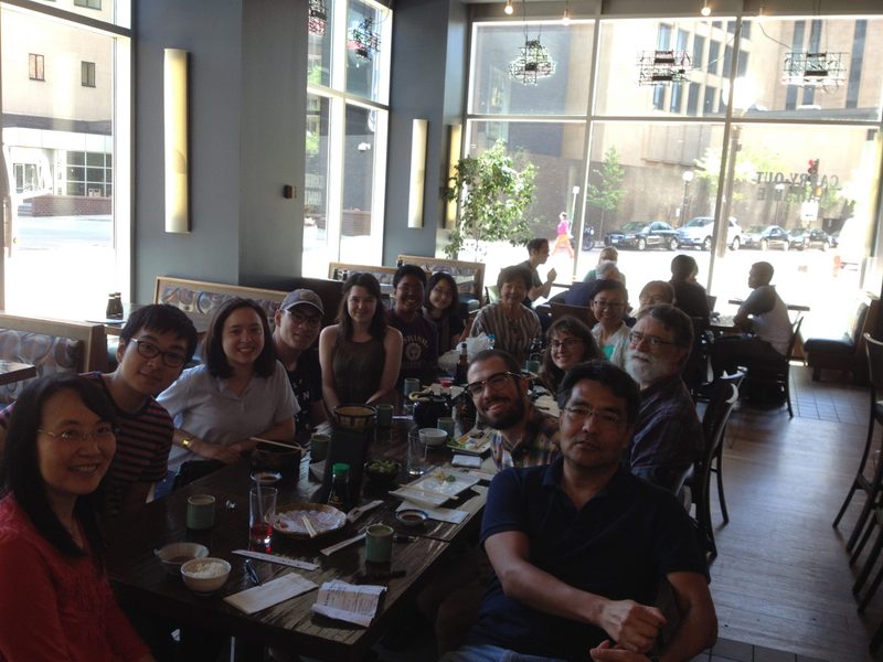 A group of students and faculty having lunch.