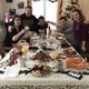 Family eating holiday brunch.