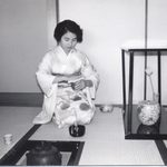 Mariko in kimono serving Japanese tea