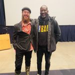 Africana Studies student worker Cameron with Akin Omotoso