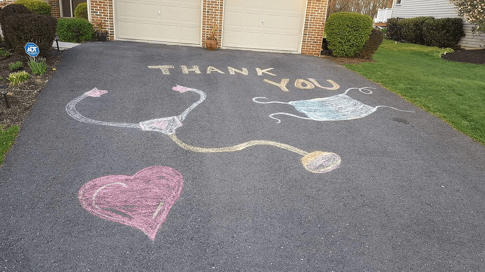 A family used chalk art to show their support to first responders.