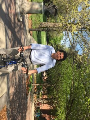 Peter Balaam, English professor, shows off his bike