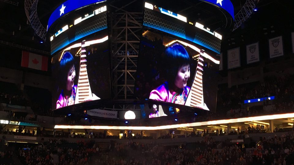 Gao Hong featured on the jumbotron as she performs the national anthem at the Target Center.