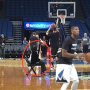 Gao Hong on the court as members of the Minnesota Timberwolves warm up before their game.