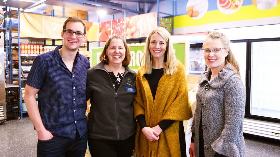 Carleton representatives and community partners at the grand reopening of the Northfield Food Shelf.