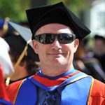 Geology department professor Clint Cowan prepares to enter the Chapel for Opening Convocation.