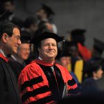 President Steven Poskanzer stands awaiting the Salutatory during Opening Convocation.