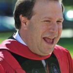President Steven Poskanzer greets faculty, students, and staff after the Opening Convocation.