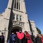 Faculty congregate outside the Chapel at the conclusion of Opening Convocation.