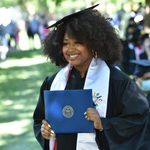 graduate with diploma