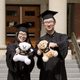 two graduates with 