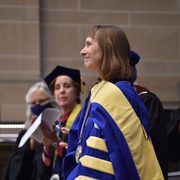 Alison Byerly smiling after being installed at Carleton's 12th President.