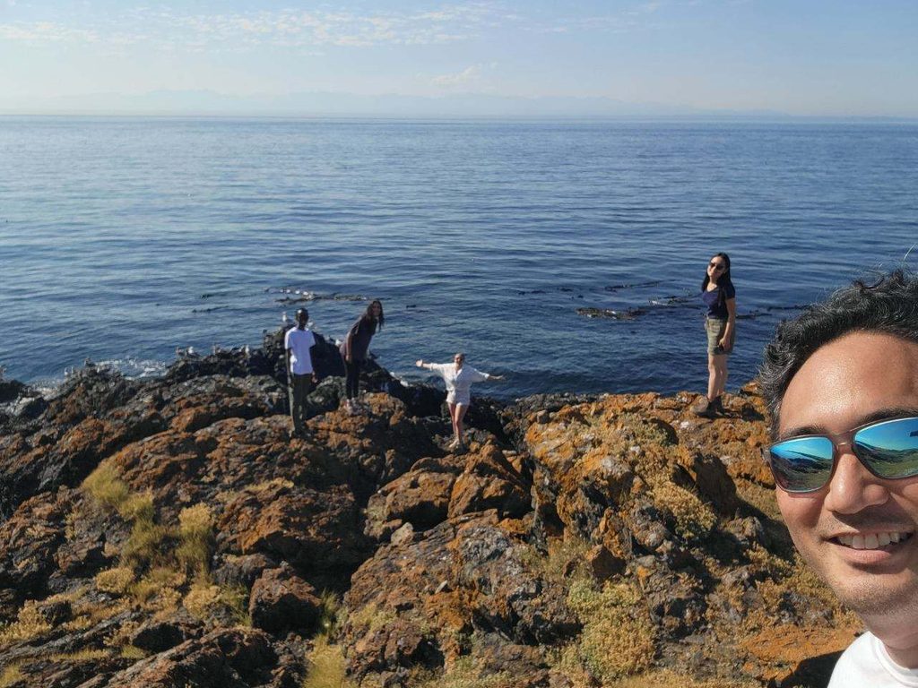 Selfie of Professor Mike Nishizaki and students exploring Dead Man’s Bay during low tide.