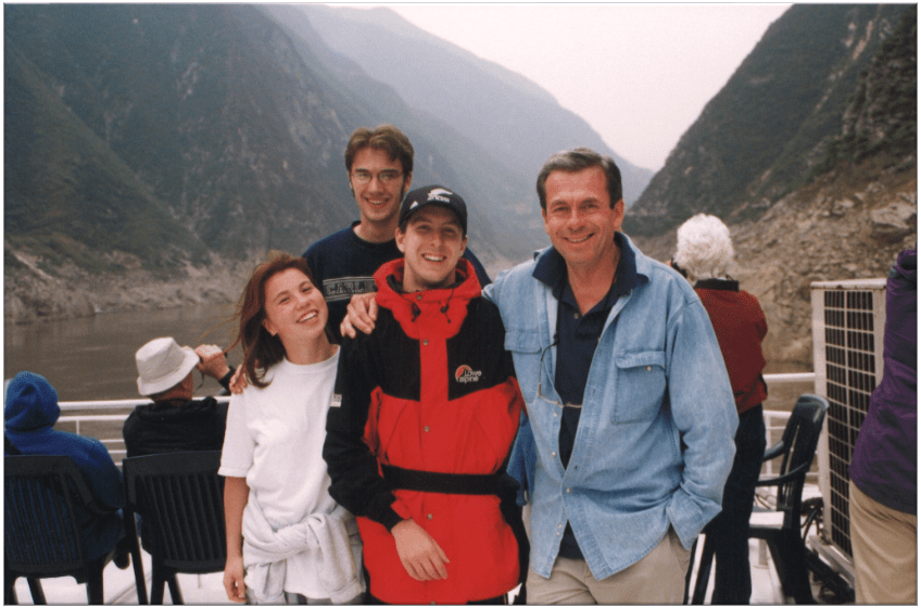Roy Grow with three students during a study abroad trip to China.