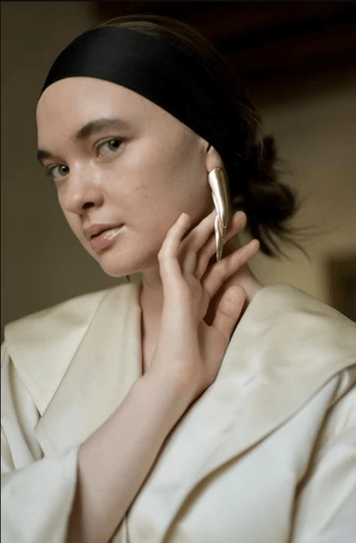 Woman wearing shala earrings