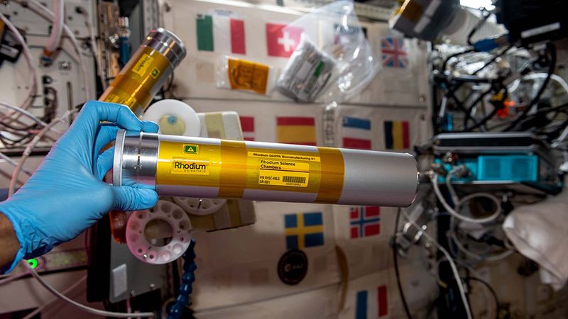 Close-up of a tube on a space station labeled 