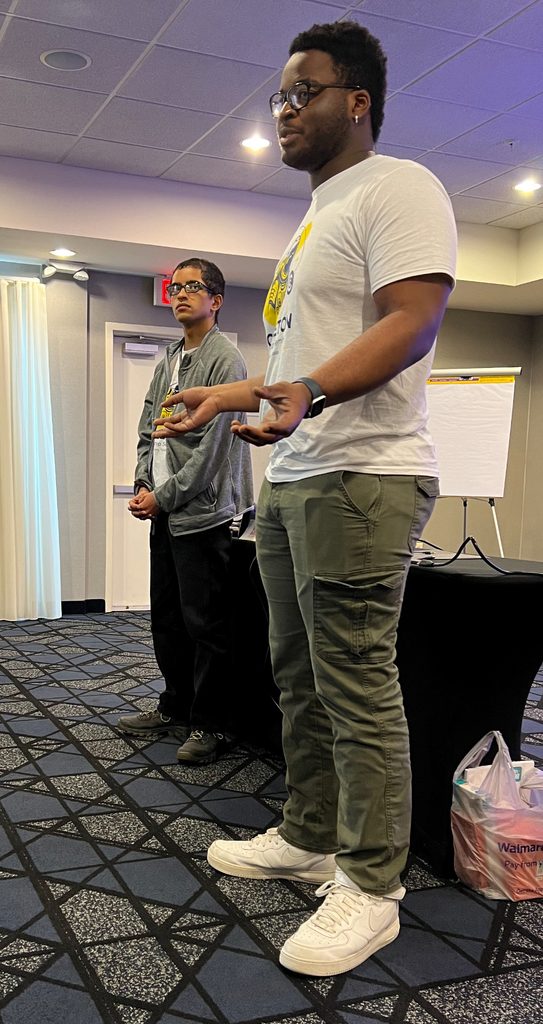 Students standing and giving a presentation