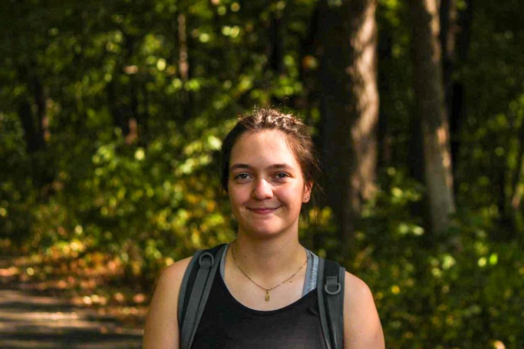 Headshot of Katrin Birk ’25, outdoors.