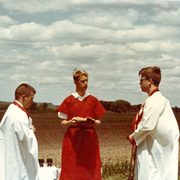 Faded photo of three Carleton students participating in a Druid ceremony.