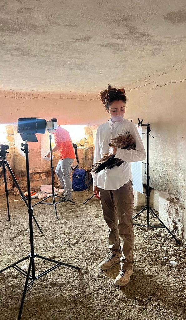 Maxima Gomez-Palmer holding a bird.
