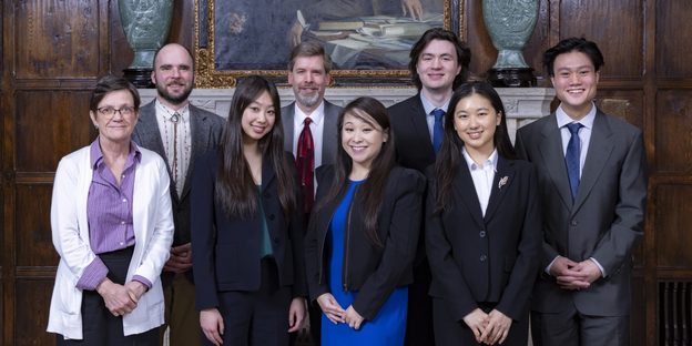 Members of the Carleton College Innovation Scholars team pose together with their faculty members.