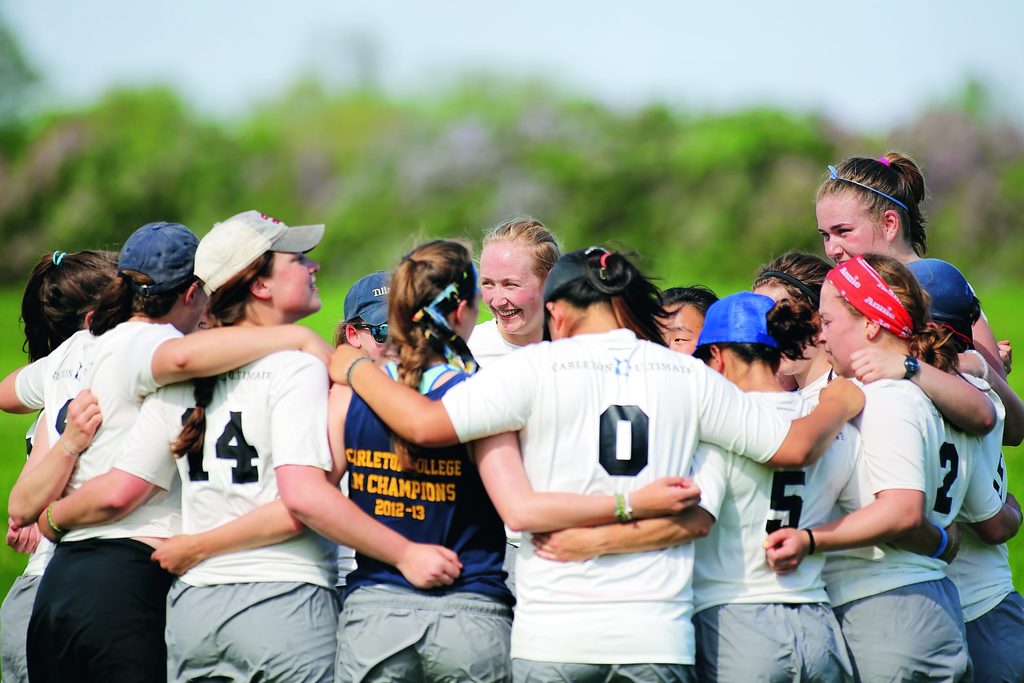 The Carleton Ultimate Frisbee team Eclipse in a huddle.
