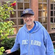 Robert Strauss in a Carleton hat and Stone Harbor sweatshirt.
