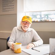 Russ Petricka sitting in the Math Skills Center.